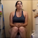 A girl farts a couple of times and takes a shit and a piss while sitting on a toilet. She also belches. Subtle, but audible sounds. About 4.5 minutes.